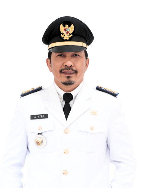 Andi Patiroi, SH, M.H
